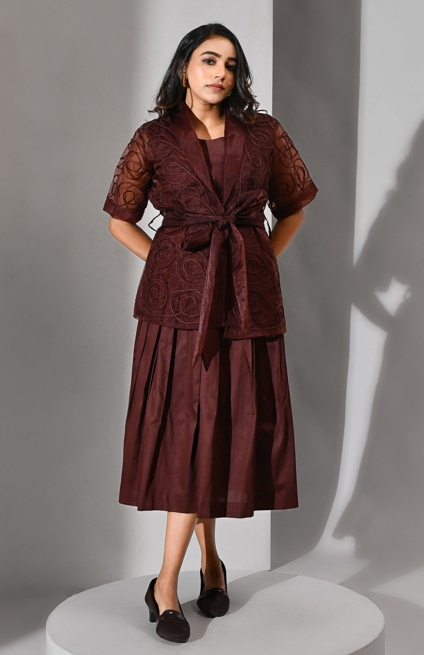 Chocolate brown three-piece set with tailored cotton skirt