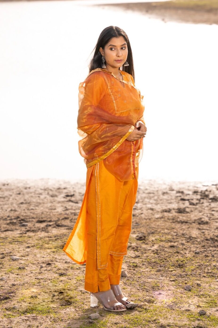 Mustard Jam cotton silk suit set with aari embroidered kurta, pants and dupatta from Golden Muslin by Priyanka Rathore