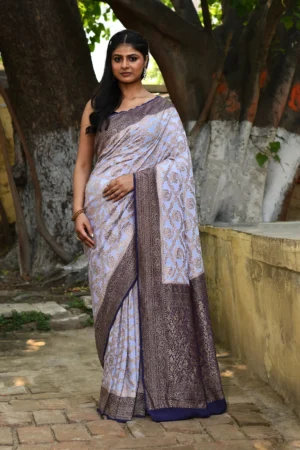 Lavender grey pure Banarasi crape chiffon silk saree handwoven with gold zari floral jaal from Golden Muslin by Naaritva Banaras