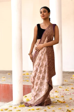 Soft peach premium silk saree with gold zari flower jaal and bels from Golden Muslin by Naaritva Banaras