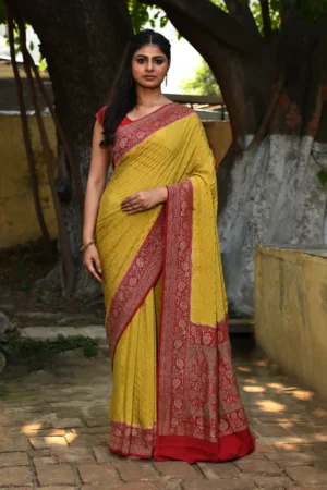 Mustard yellow silk saree with gold zari buti from Golden Muslin by Naaritva Banaras
