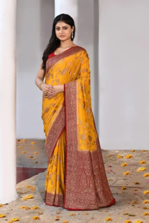 Mustard yellow Banarasi silk saree handwoven with gold zari flower jaal and maroon border from Golden Muslin by Naaritva Banaras