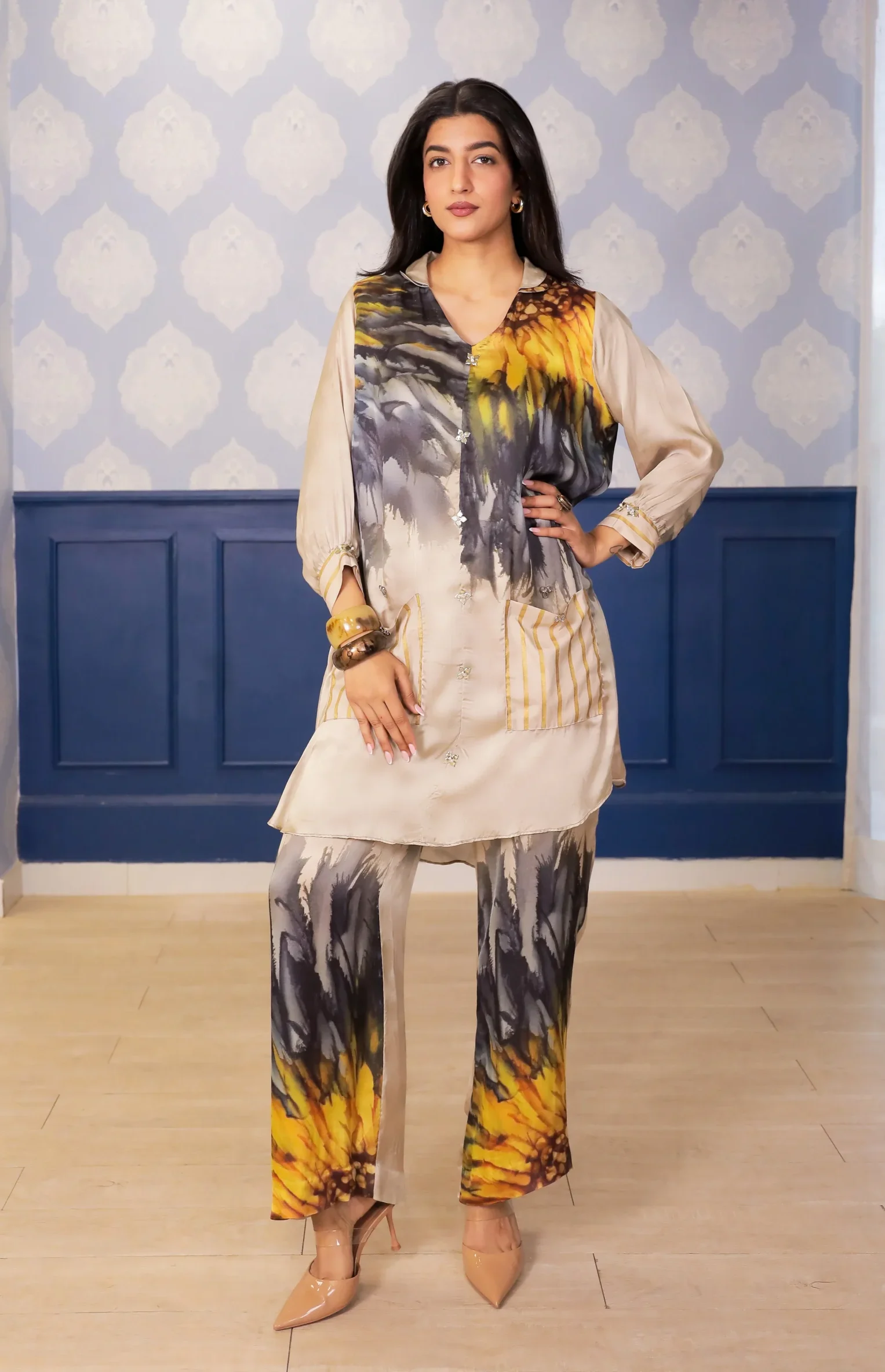 Beige sunflower print satin kurta set with Peter Pan collar from Golden Muslin By Soniya G