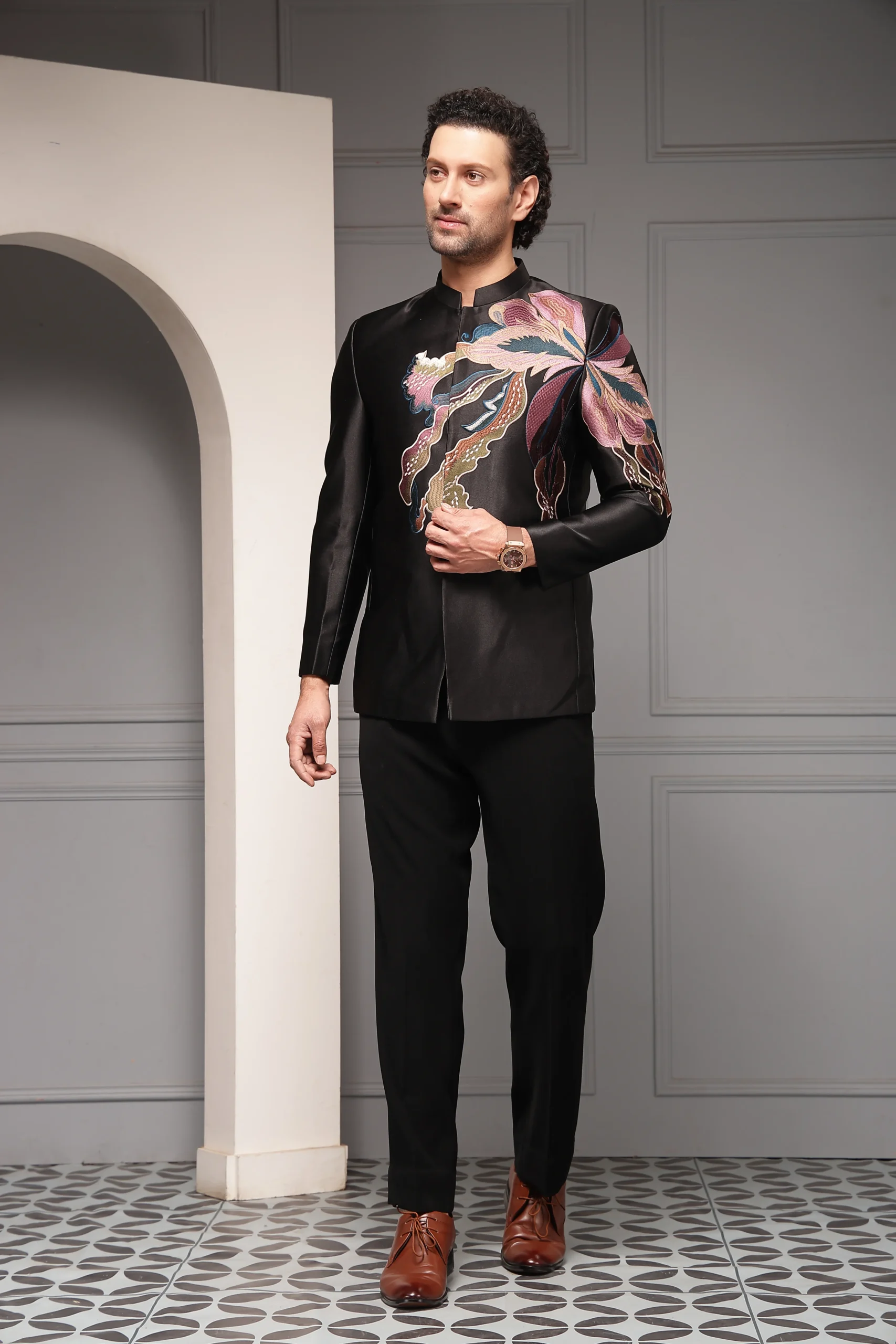 Contemporary black bandhgala set with multicolour floral embroidery from Golden Muslin By Soniya G