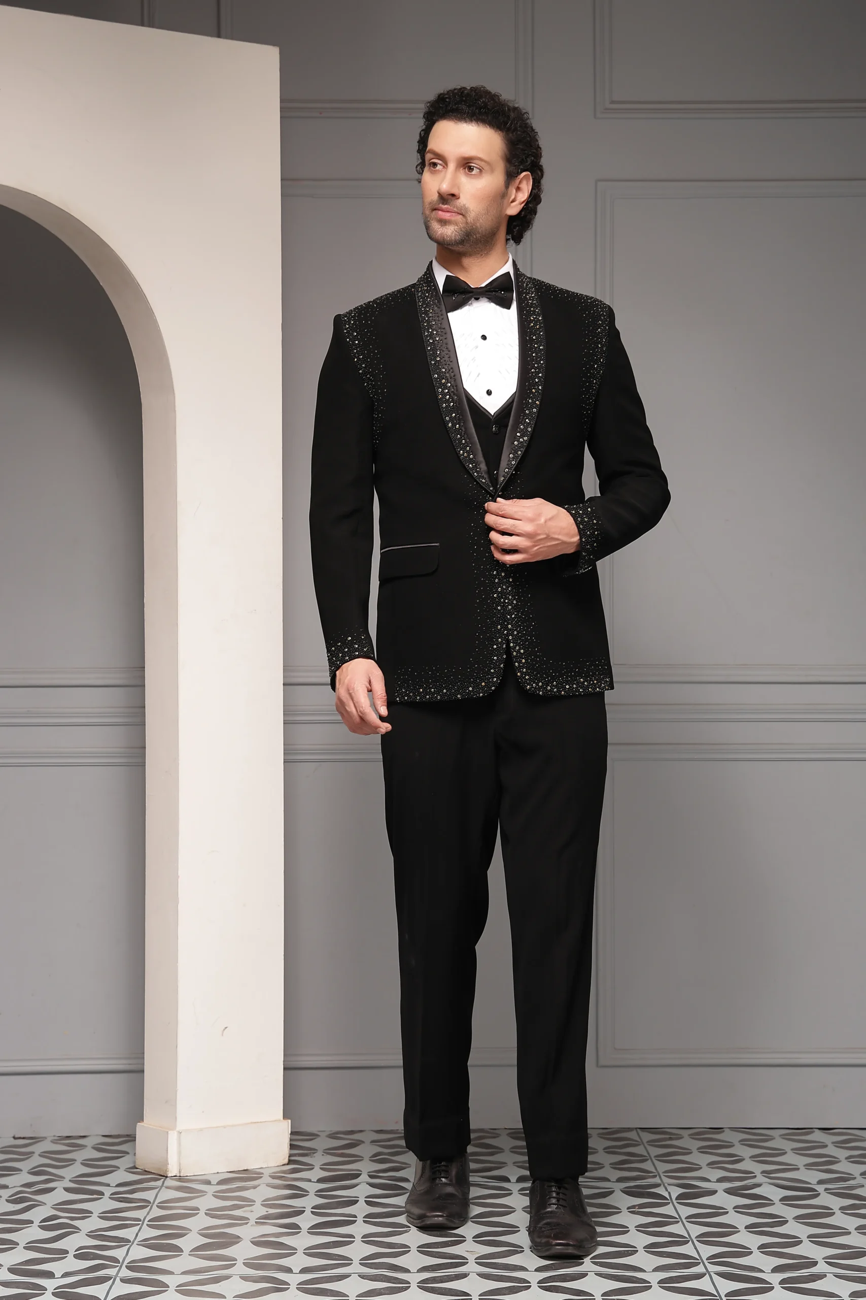Black embellished tuxedo set with satin shawl lapel from Golden Muslin By Soniya G