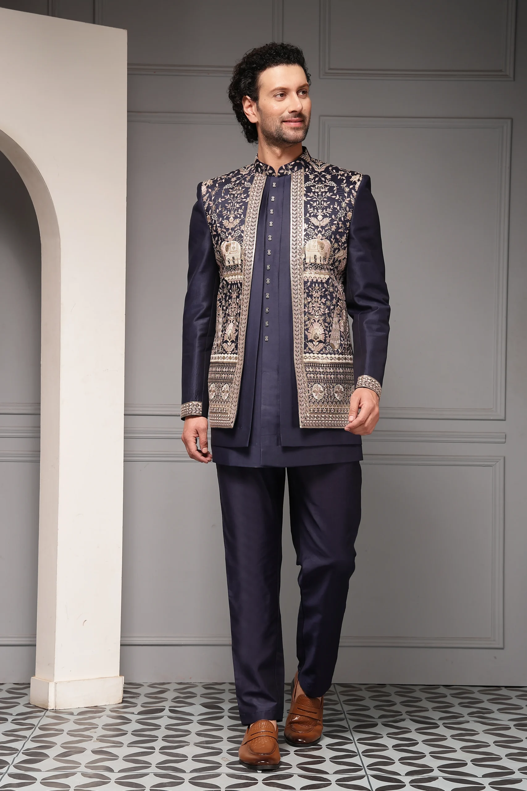 Navy blue silk-blend embroidered bandhgala jacket with tailored trousers from Golden Muslin By Soniya G