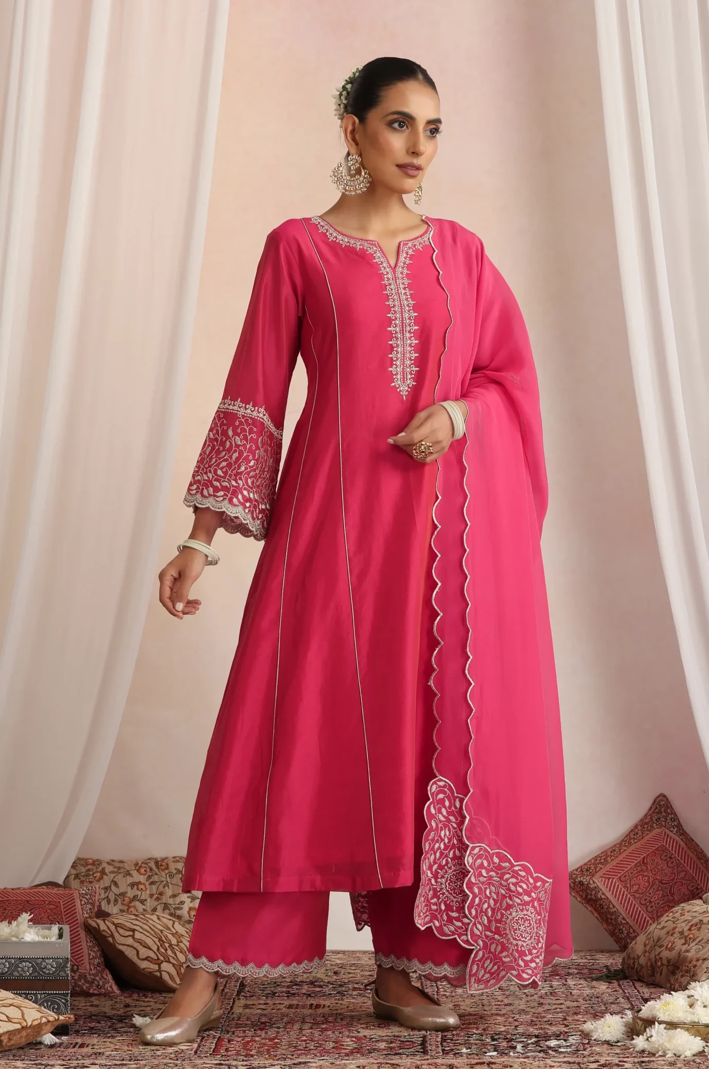 Deep pink flowy ethnic kurta set with dupatta from Golden Muslin By Suikala