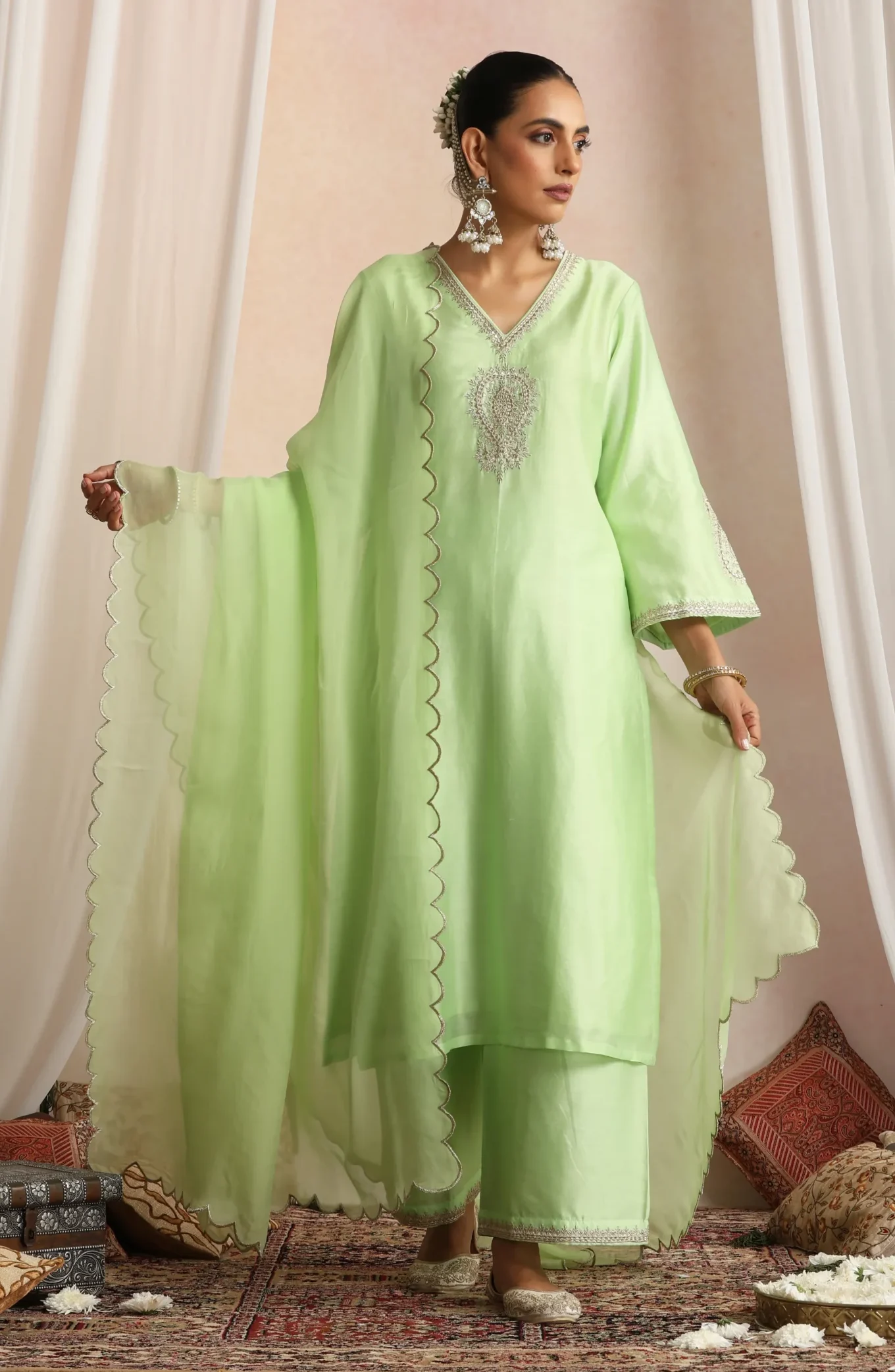Pastel green flowy ethnic kurta set with dupatta from Golden Muslin By Suikala