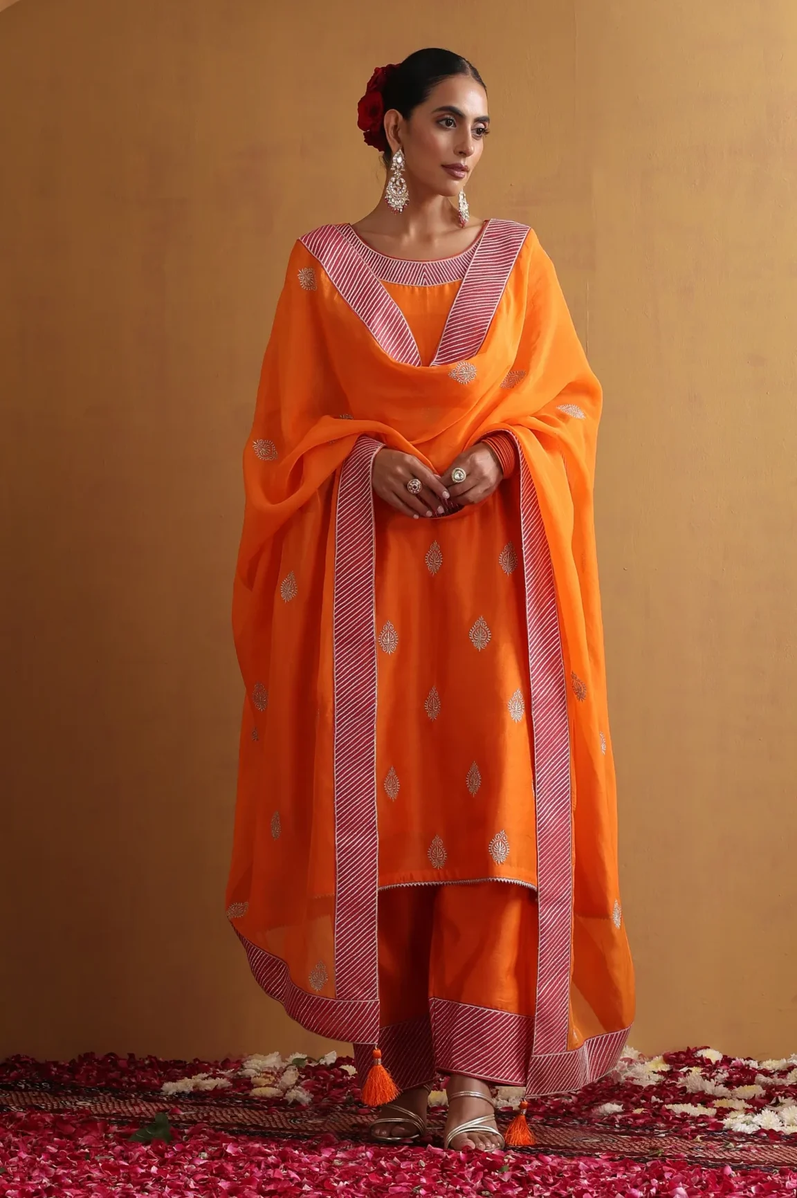 Vibrant orange embroidered ethnic suit set with dupatta from Golden Muslin By Suikala