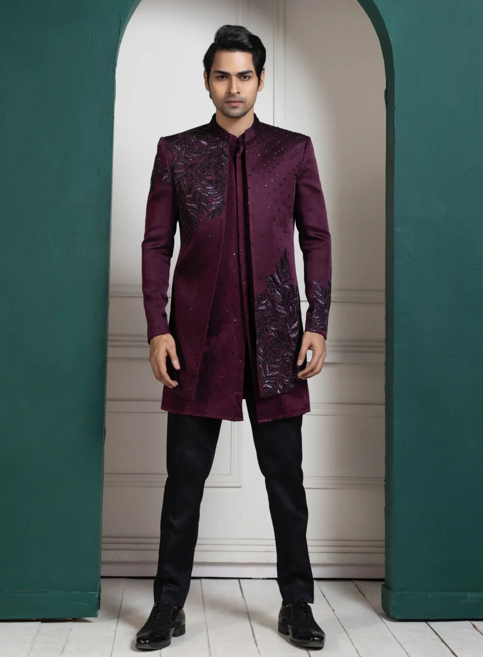 Golden Muslin Maroon Asymmetric Indo-Western Set with sequin embroidery and black slim-fit trousers