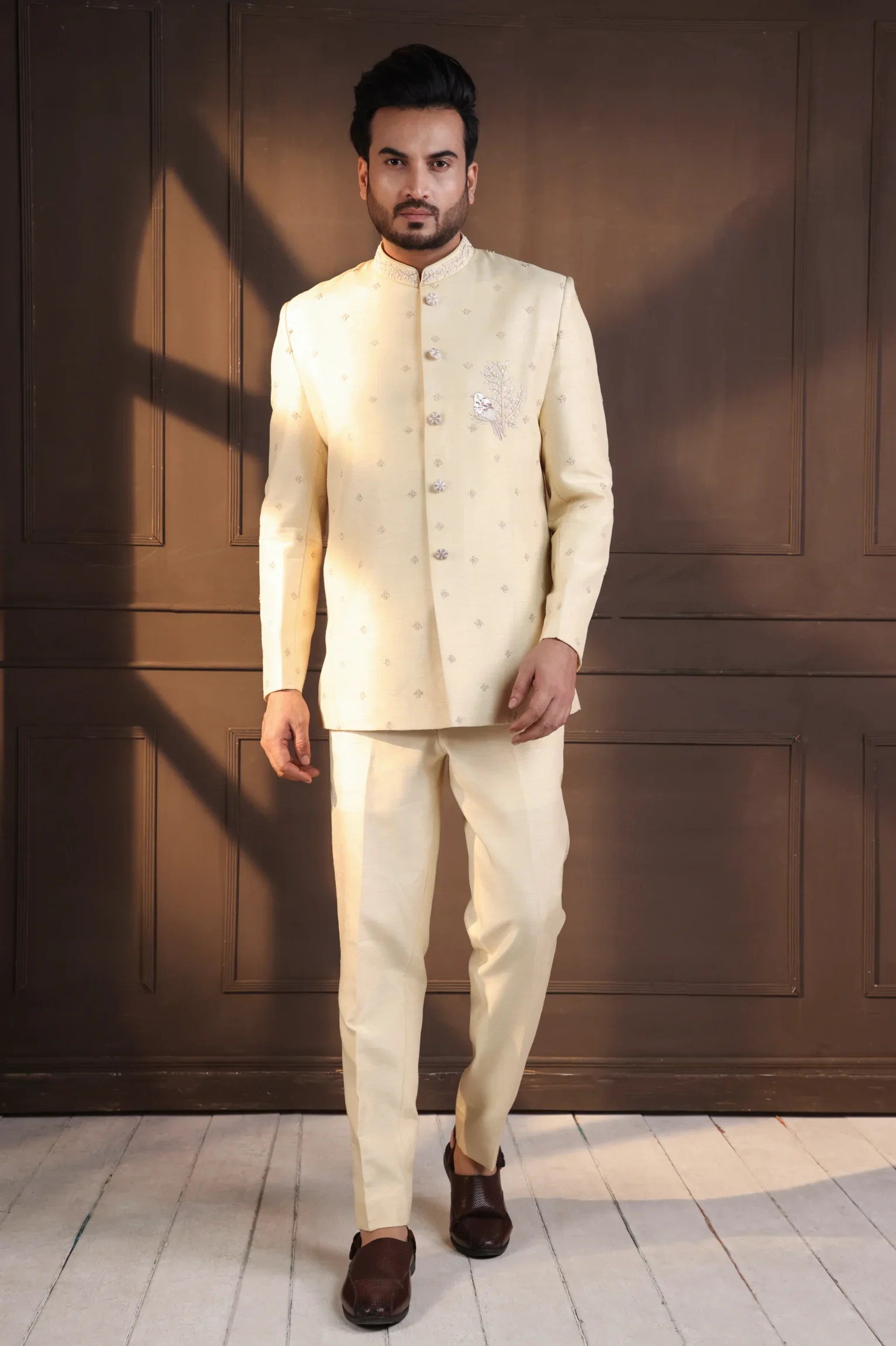 Golden Muslin Ivory Embellished Bandhgala Suit with tailored fit and matching trousers