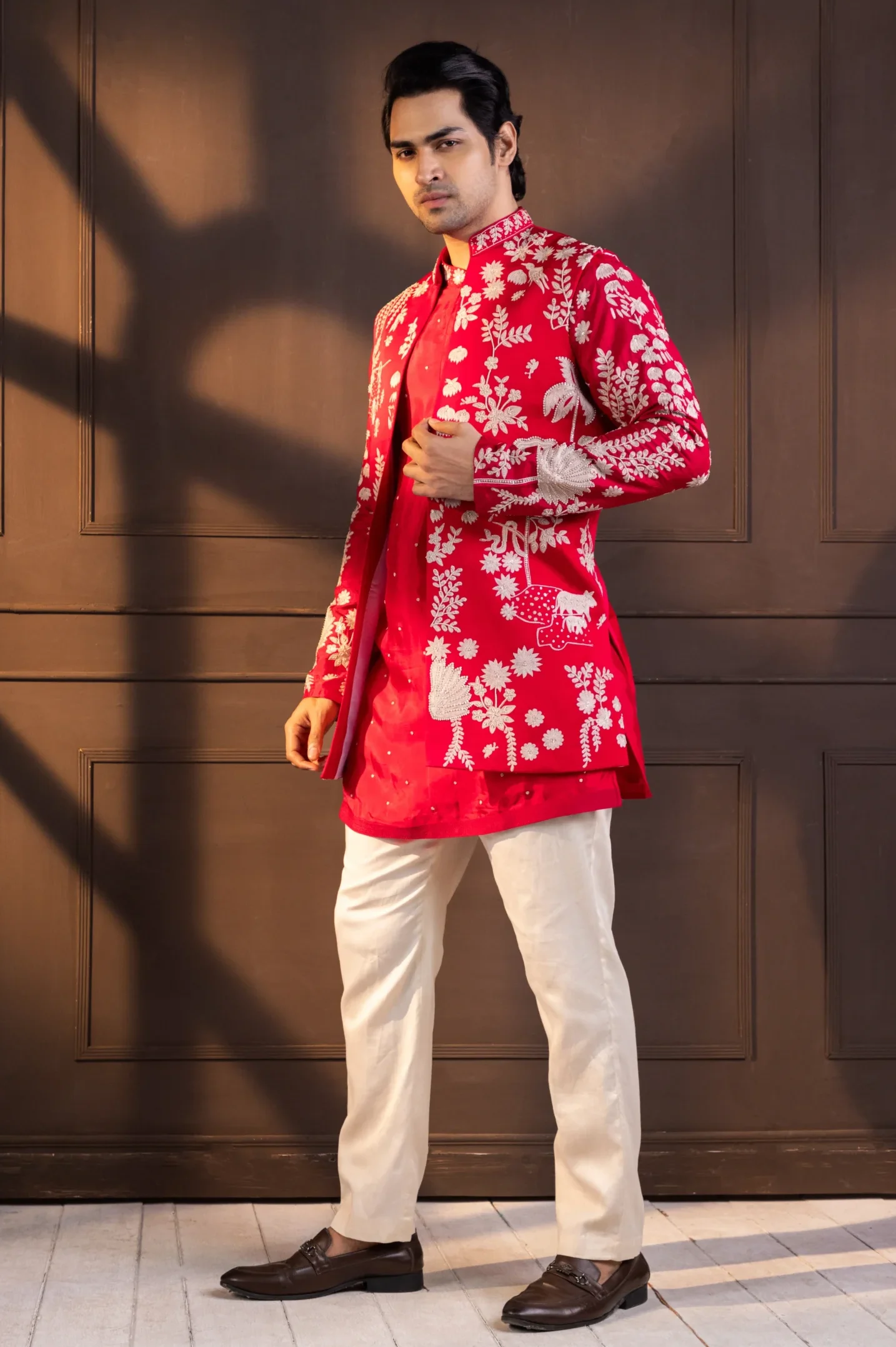 Golden Muslin Crimson Embroidered Nehru Jacket Set with tropical ivory detailing and off-white trousers