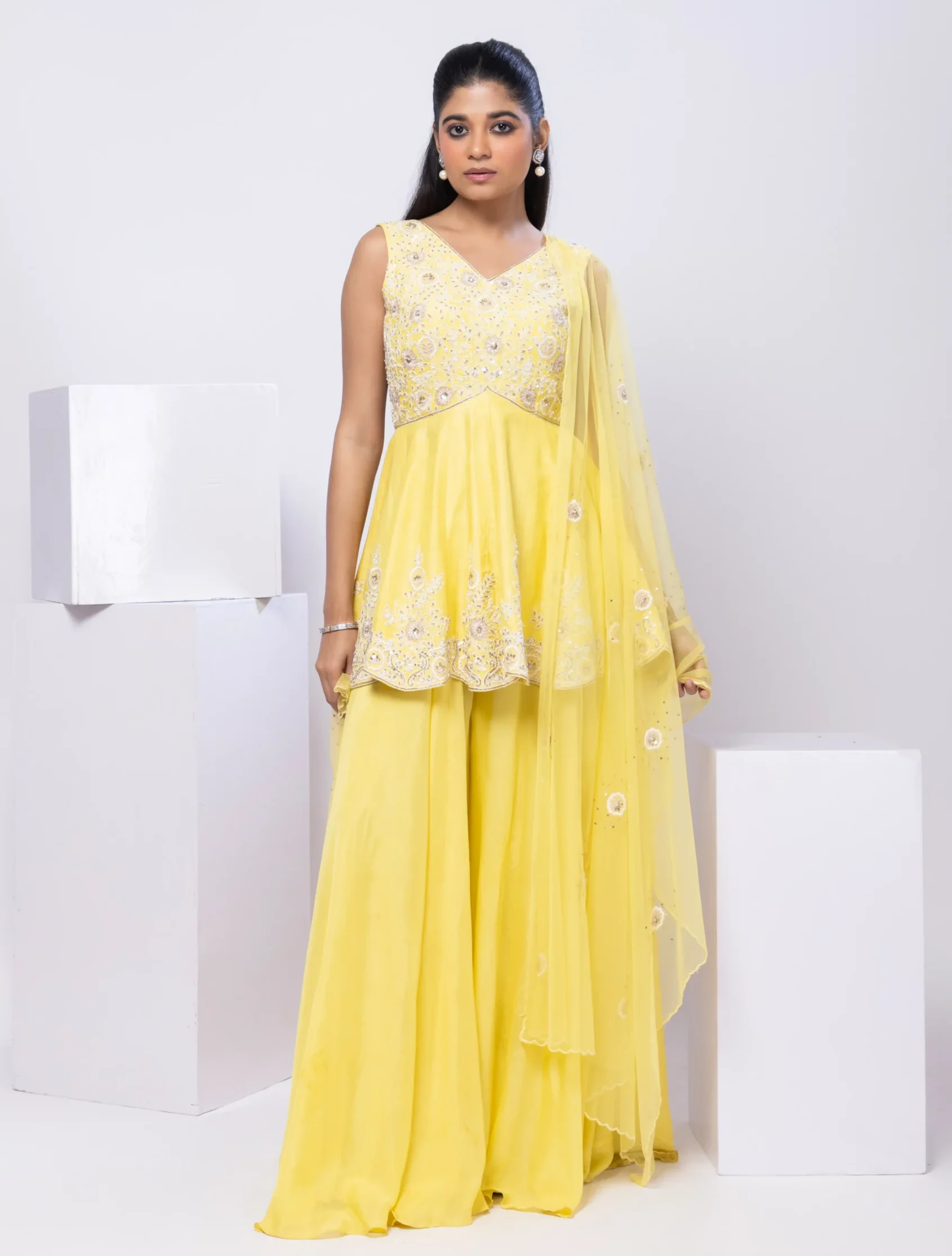 Radiant Yellow Embroidered Peplum Palazzo Set from Golden Muslin By Anuj Agarwal