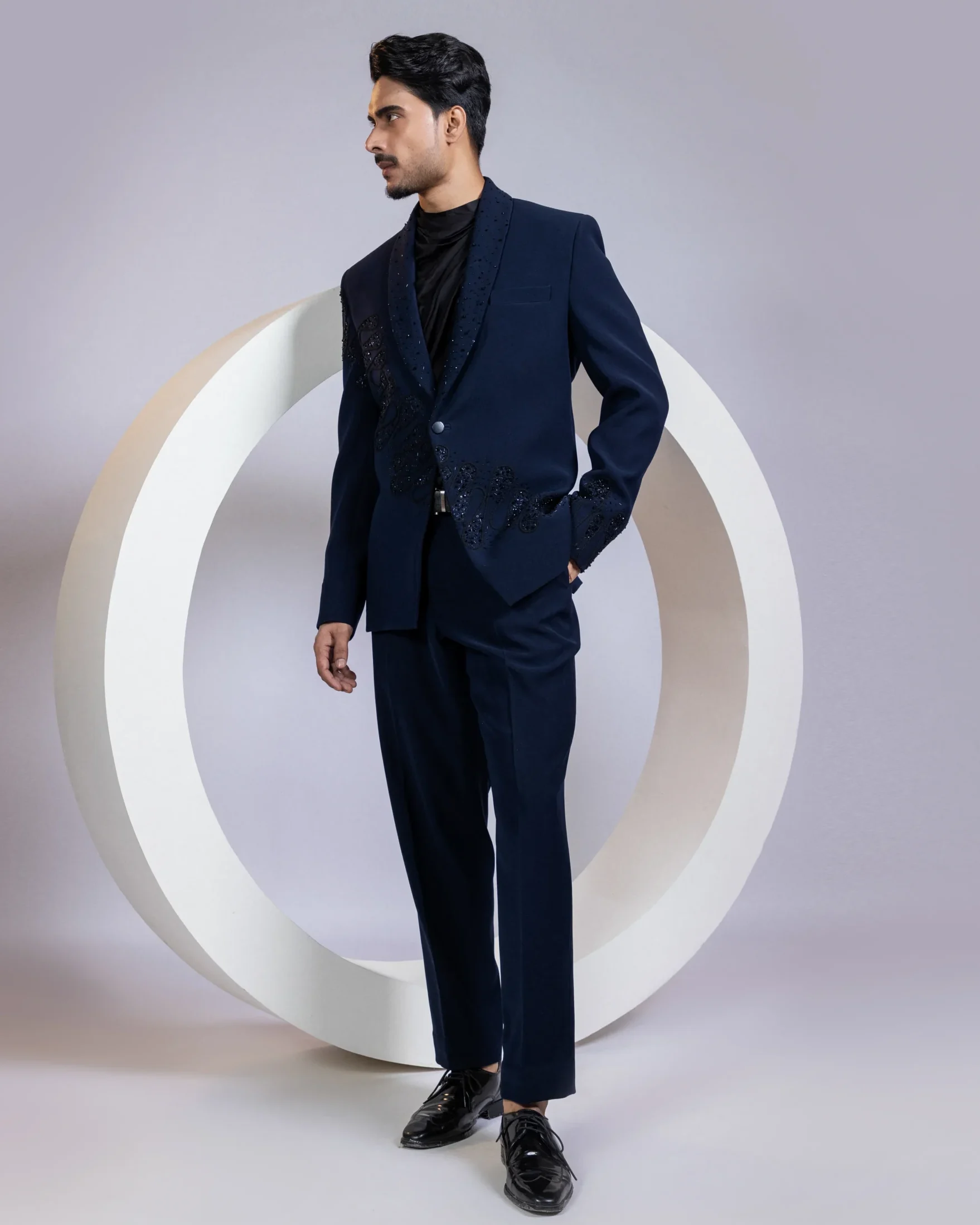 Deep navy embellished blazer set with asymmetric black shirt from Golden Muslin By Anuj Agarwal