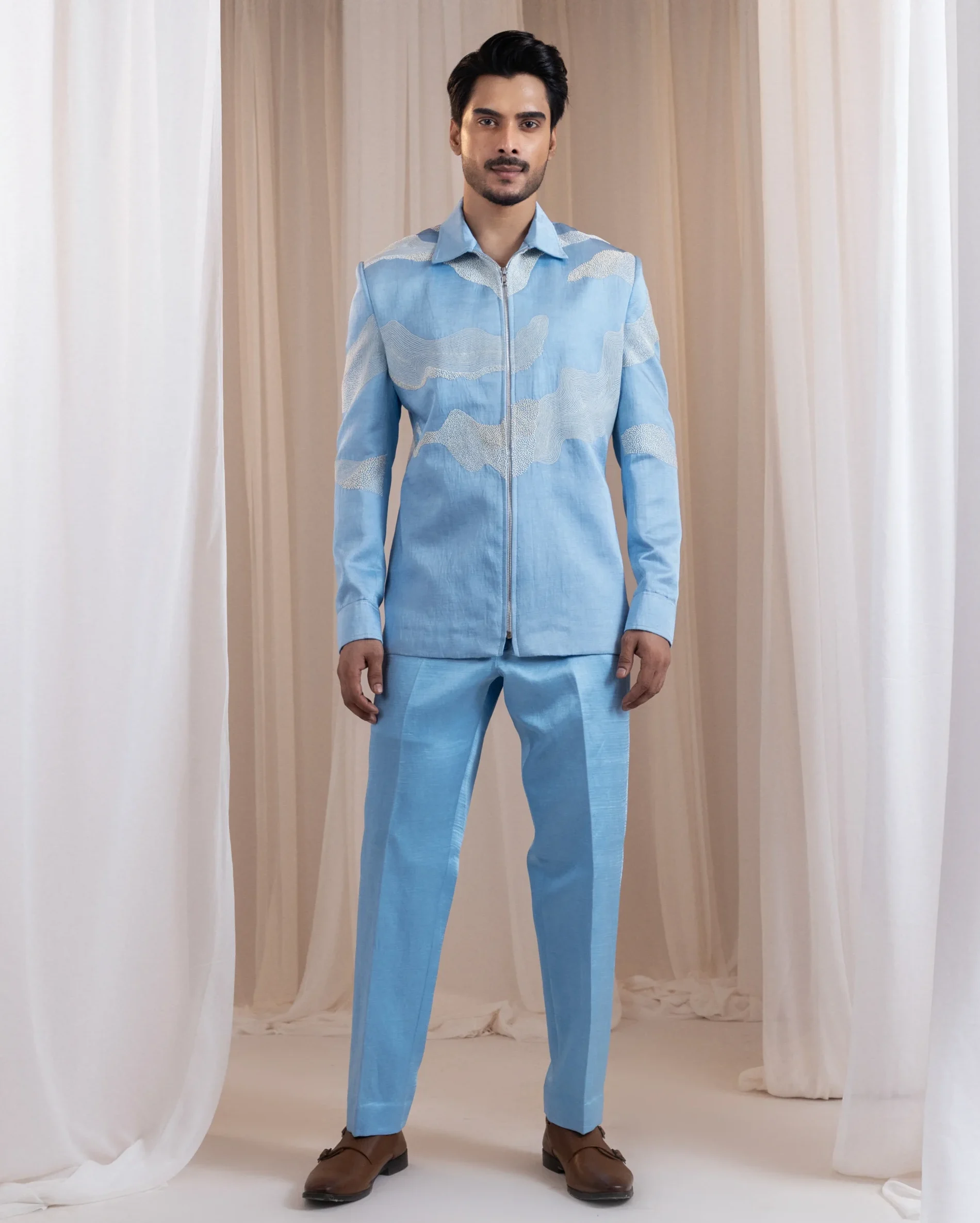 Powder blue coordinated shirt jacket and trousers set from Golden Muslin By Anuj Agarwal