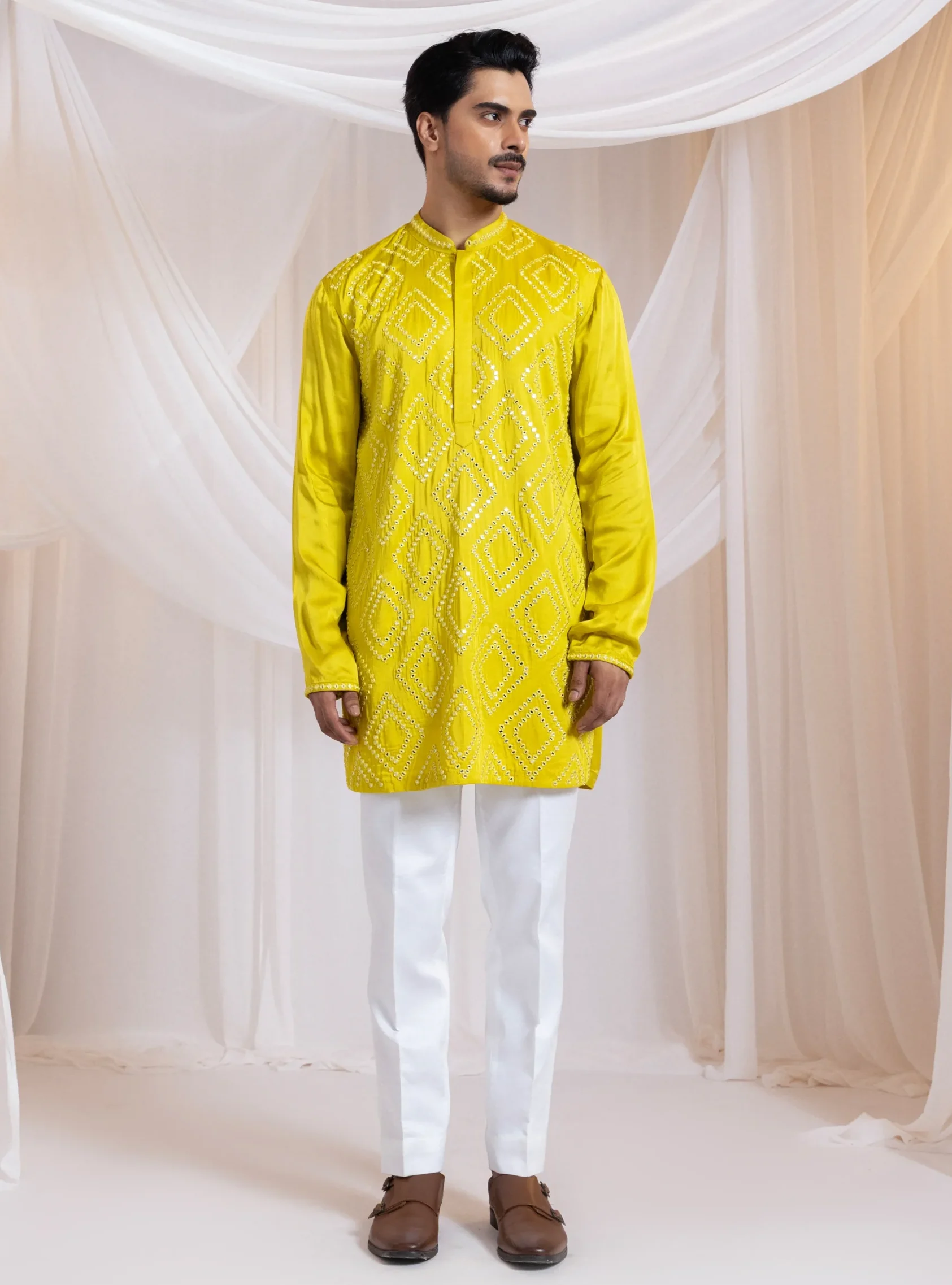 Yellow two-piece kurta set with geometric diamond mirrorwork embroidery from Golden Muslin By Anuj Agarwal