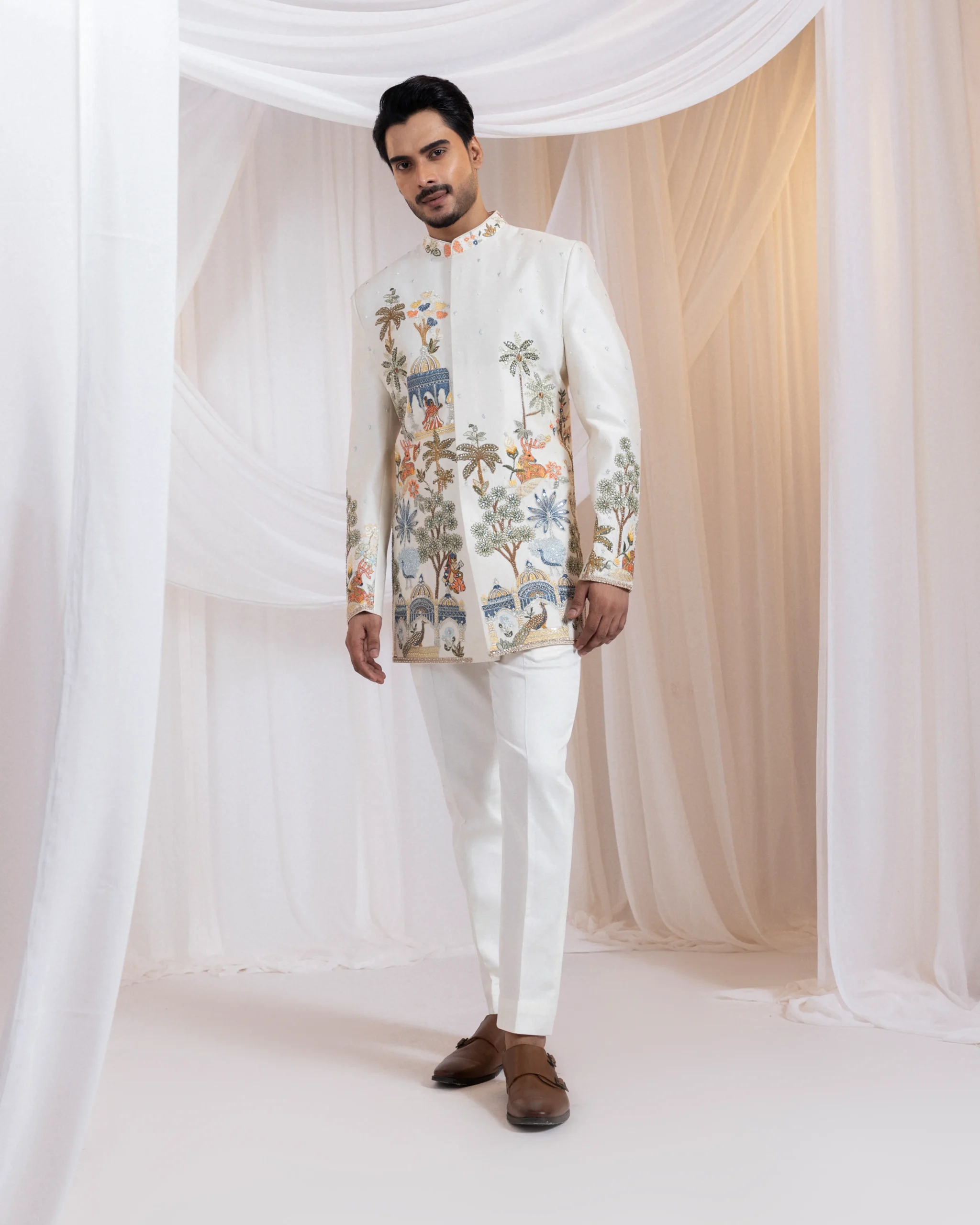 Ivory Mughal embroidered bandhgala with pearl and sequin detailing from Golden Muslin By Anuj Agarwal