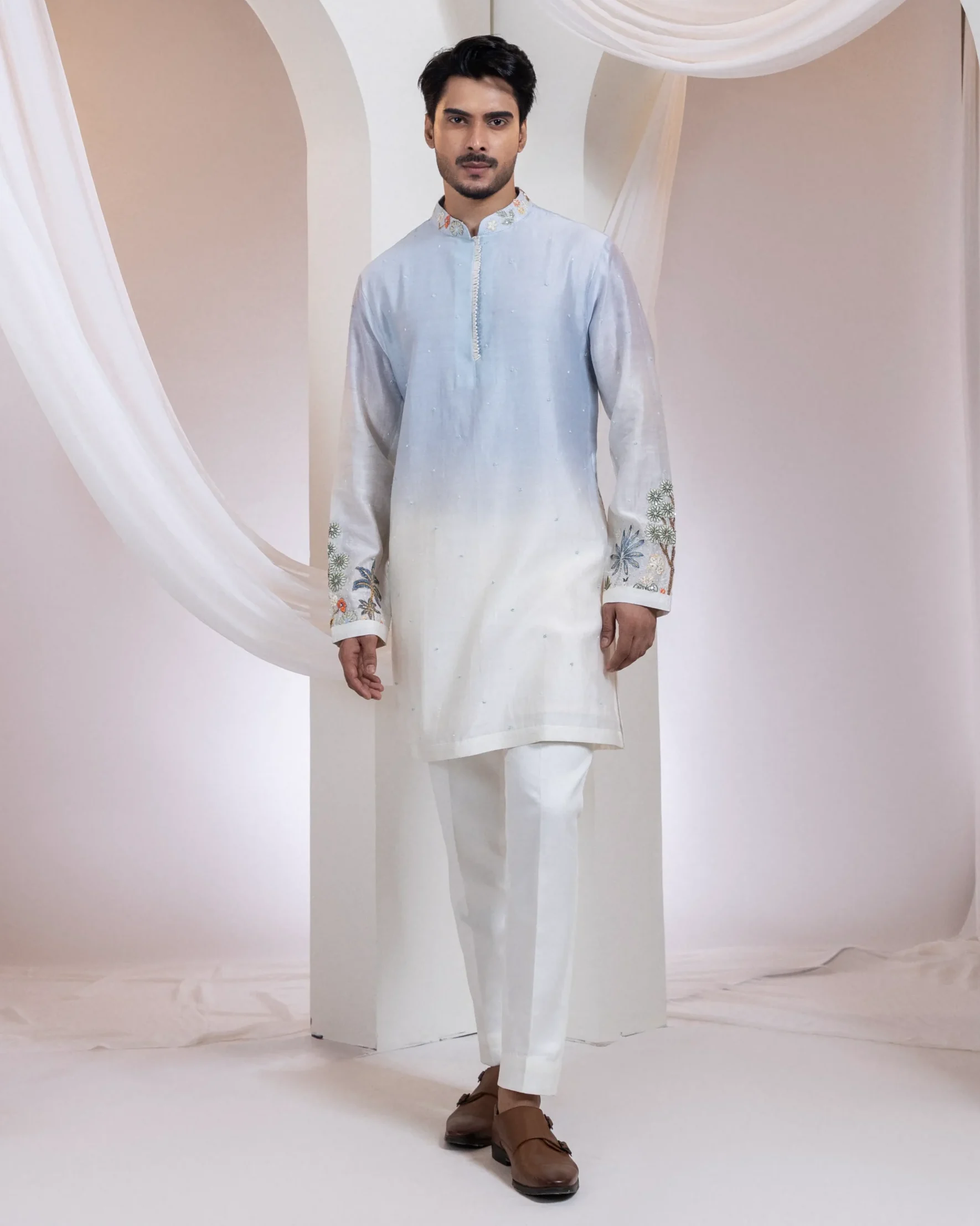 Powder blue ombre embroidered kurta set with Mughal motifs from Golden Muslin By Anuj Agarwal