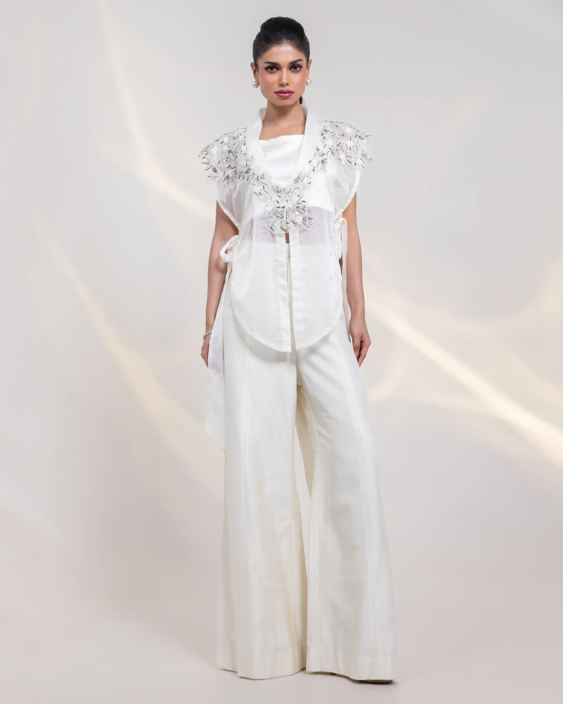 White Three Piece Bustier Set with 3D Floral Embroidered Jacket from Golden Muslin By Anuj Agarwal