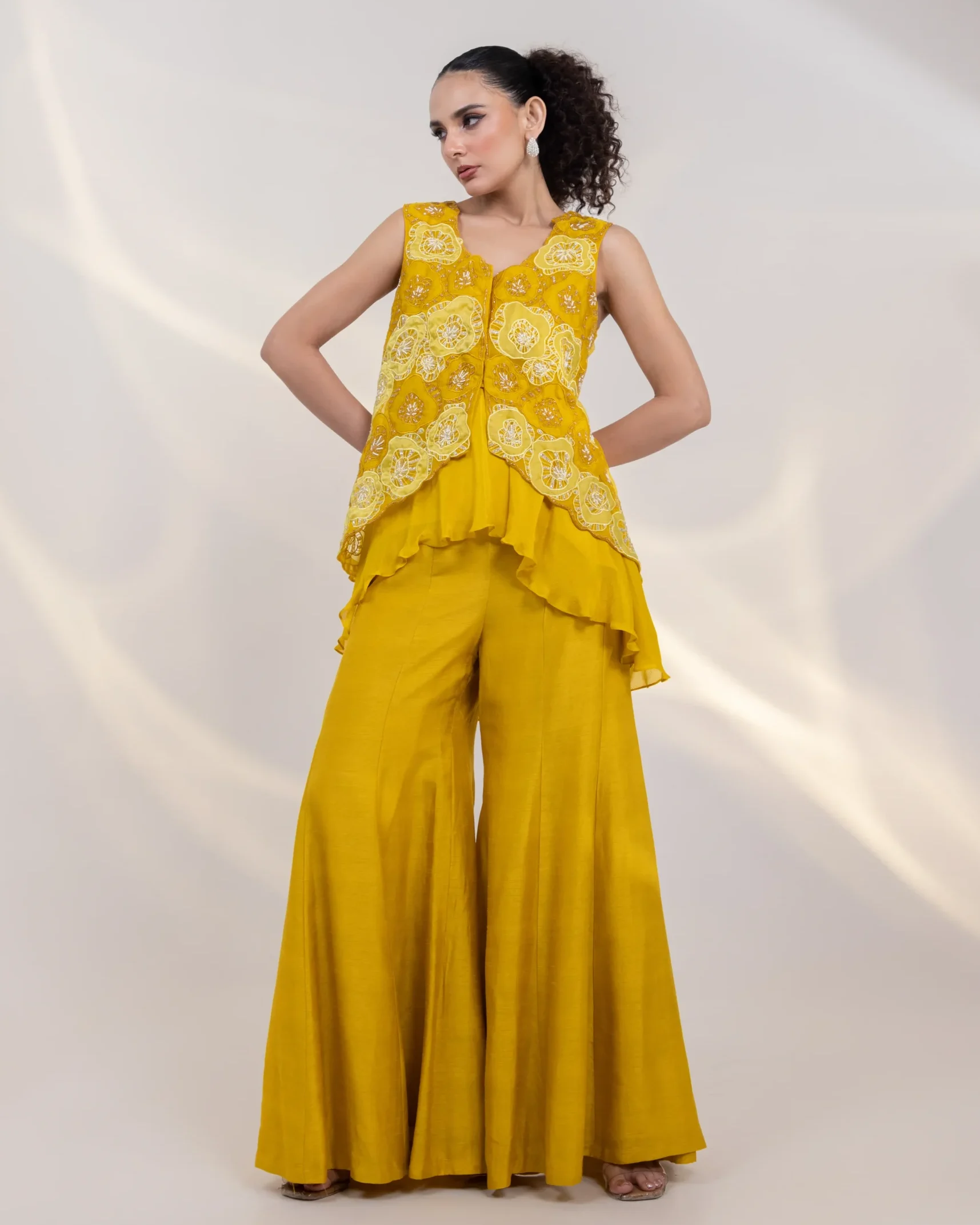 Mustard Yellow Asymmetrical Embroidered Tunic with Wide Leg Sharara from Golden Muslin By Anuj Agarwal