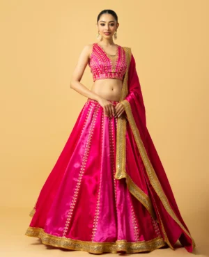 Pink Ombre Modal Satin Lehenga with cutdana and zari embroidery from Golden Muslin By Quench A Thirst