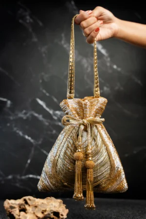 Hinted Gold Beaded Potli Bag with Tassel Detailing and Elegant Drawstring