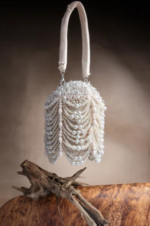 Off White Pearl Scalloped Potli with Tassels and Decorative Lock