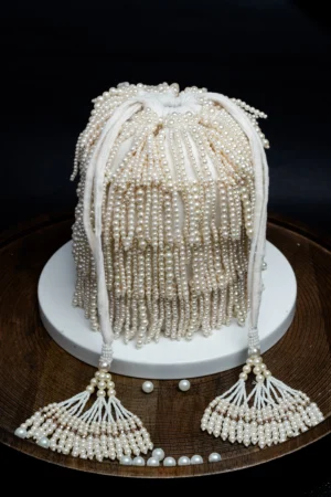 Pearl Beaded Tassel Potli with Intricate Handwork and Elegant Finish