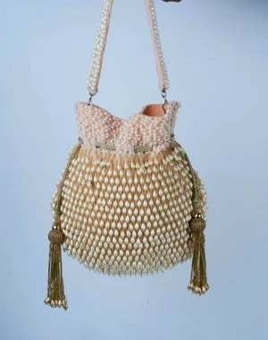 Blush Pink Pearl Tassel Potli with Beaded and Intricate Pearl Work