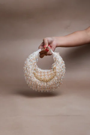 Cream Lattice Work Tasseled Potli with Beaded Tassel Detailing