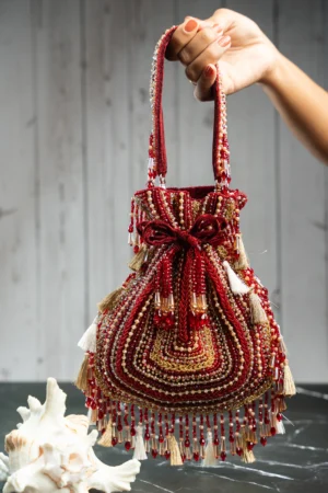 Baraq Red & Gold Beaded Potli with Intricate Work and Elegant Tassels
