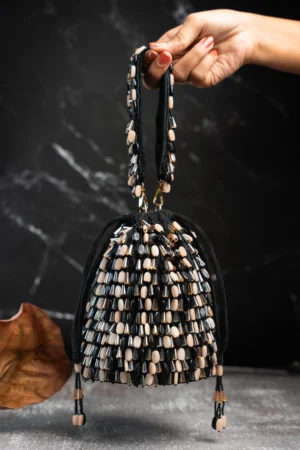 Cream & Black Beaded Tassel Potli with Intricate Handcrafted Work