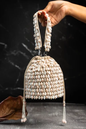 White & Light Gold Beaded Tassel Potli with Intricate Handcrafted Work