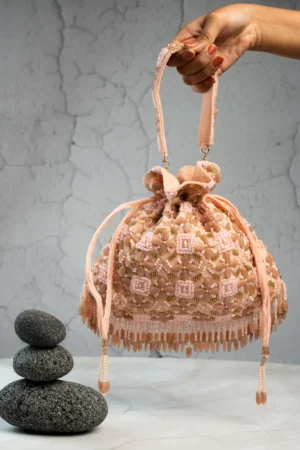 Pink & Brown Beaded Tassel Potli with Intricate Handcrafted Work