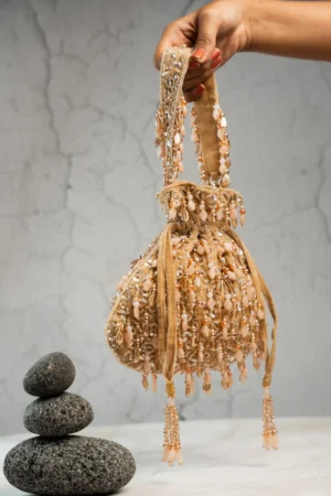 Cream & Gold Beaded Tassel Potli with Intricate Handcrafted Work
