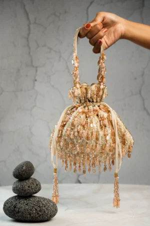 Cream Beaded Tassel Potli with Intricate Handcrafted Detailing