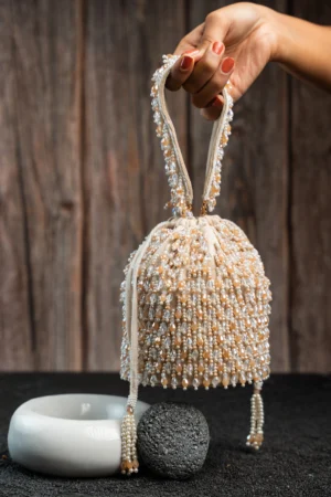 Gold & Pearl Beaded Tassel Potli with Intricate Handcrafted Work