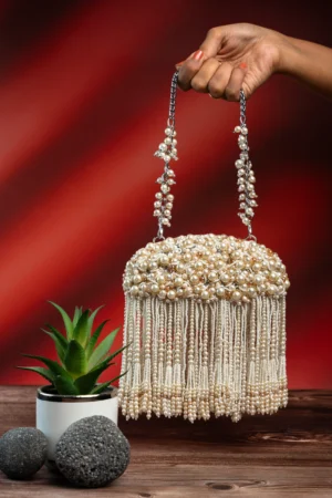 Pearl Beaded Tassel Clutch with Intricate Work and Metallic Handle
