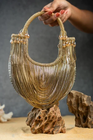 Gold Tasseled Boat Shape Potli Bag with Metallic Chains and Beaded Handle