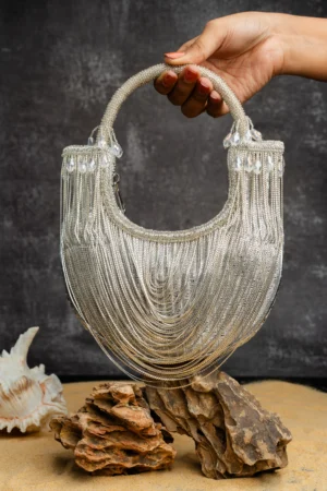 Silver Tasseled Boat Shape Potli Bag with Metallic Chains and Beaded Handle