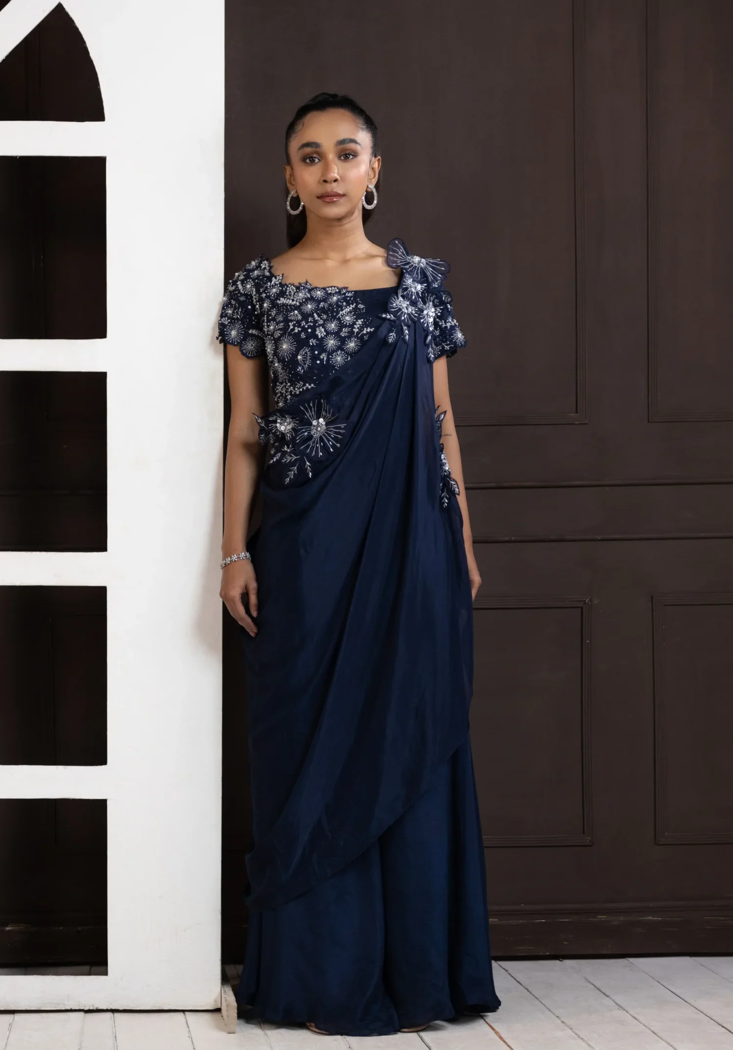 Navy Blue Embellished Drape Ensemble with floral lace applique from Golden Muslin By Anuj Agarwal