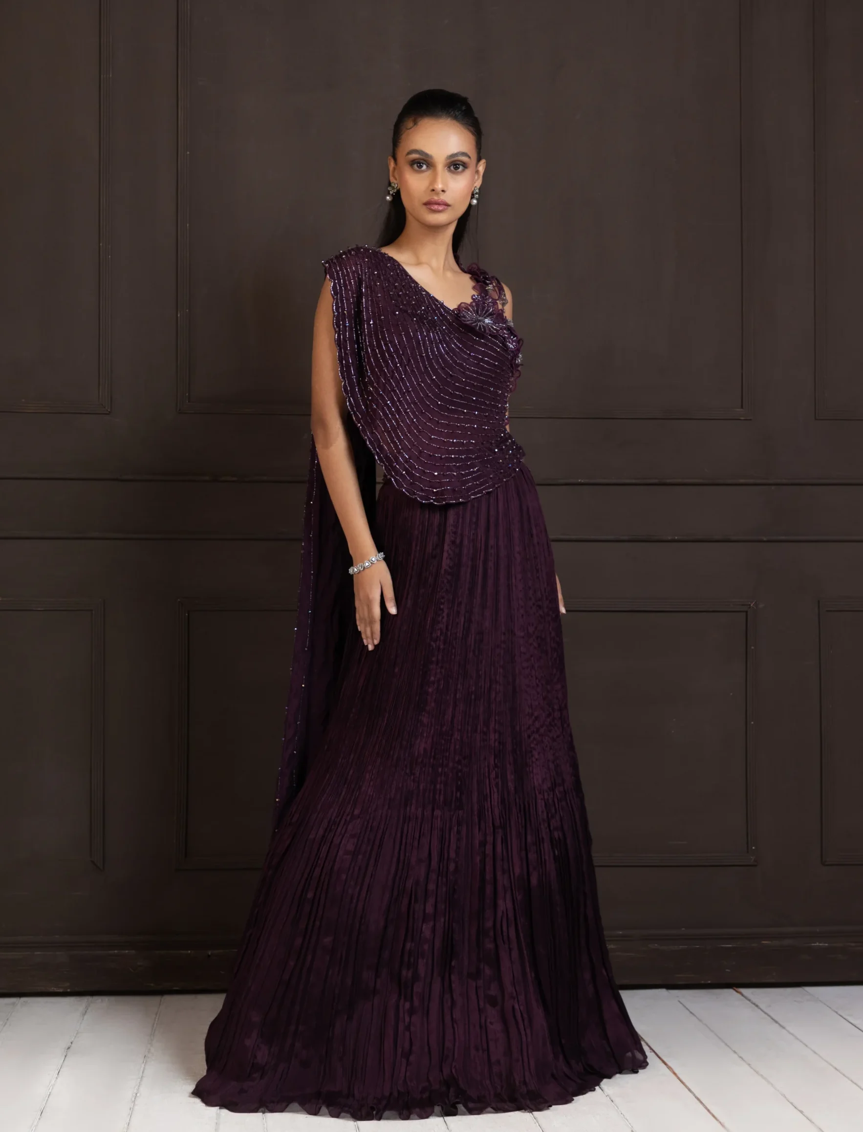 Plum Embellished Lehenga Set with cape style blouse from Golden Muslin By Anuj Agarwal