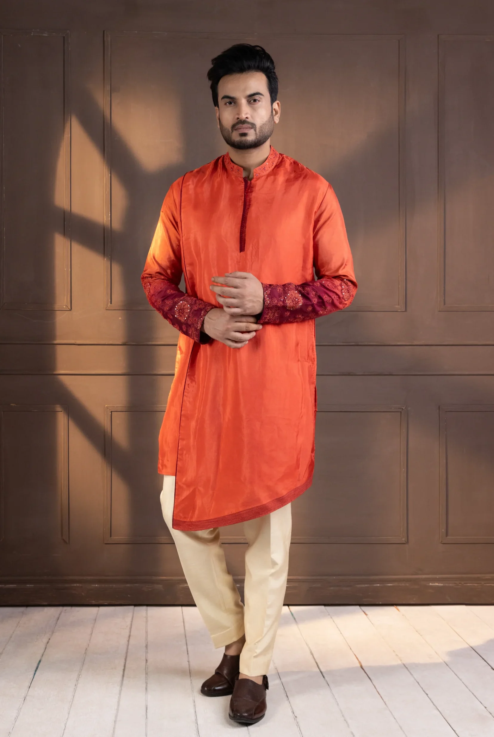 Asymmetric Rust Embroidered Kurta with mandarin collar from Golden Muslin By Anuj Agarwal