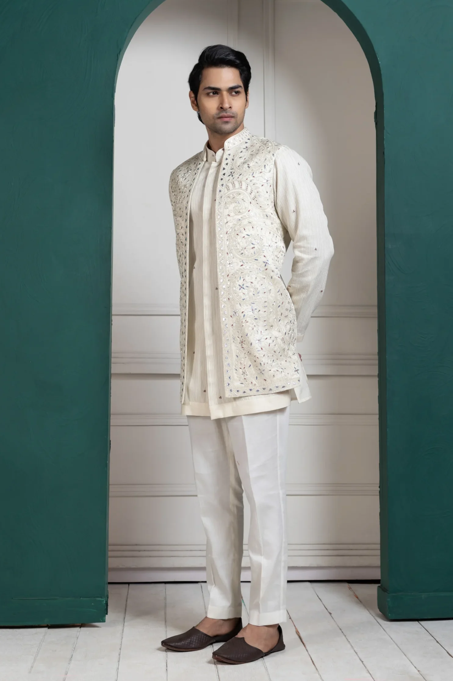 Ivory Kurta and Mirror Work Jacket Set with embroidered sleeveless jacket from Golden Muslin By Anuj Agarwal
