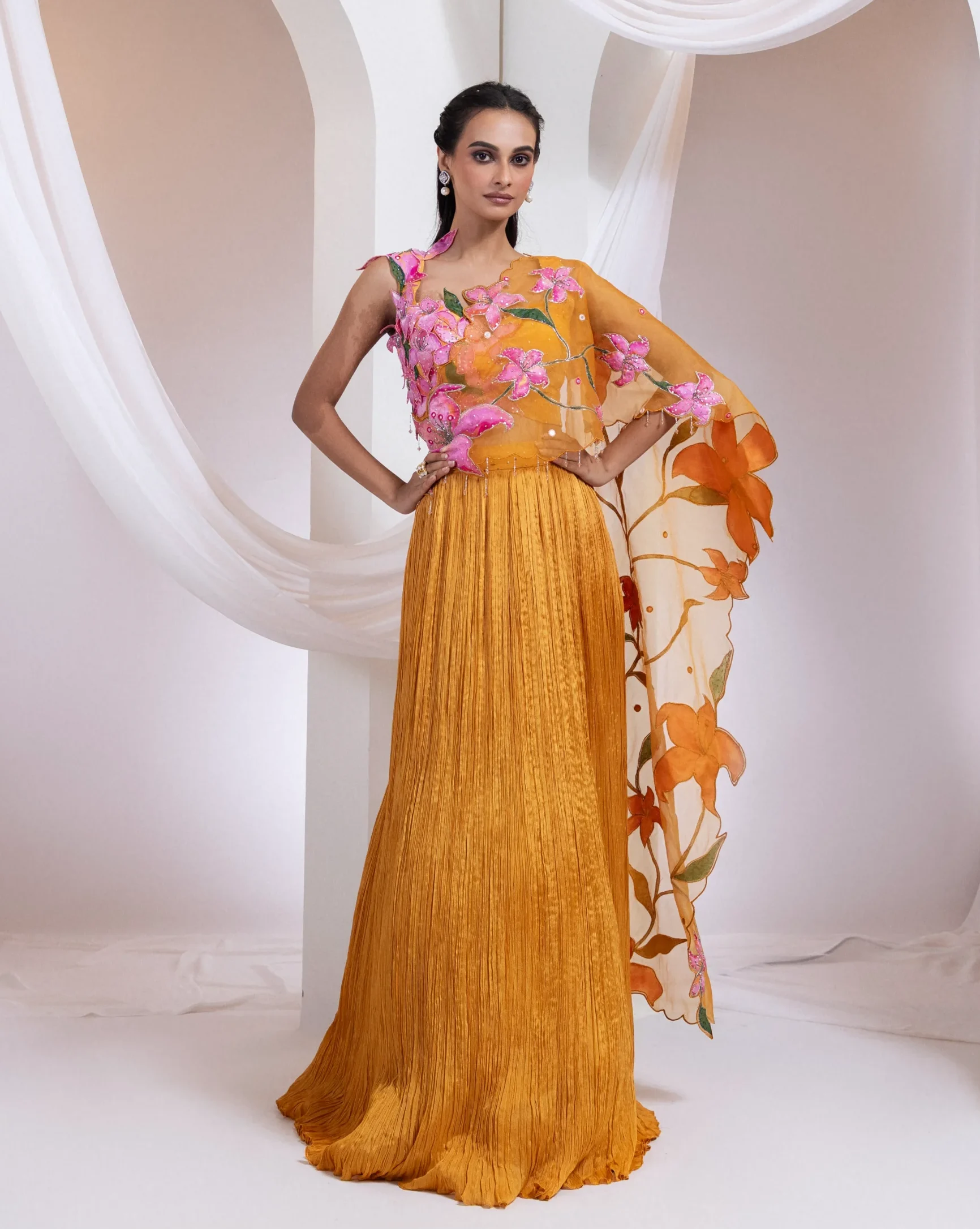 Kesar Orange Lehenga Set with floral applique and organza dupatta from Golden Muslin By Anuj Agarwal