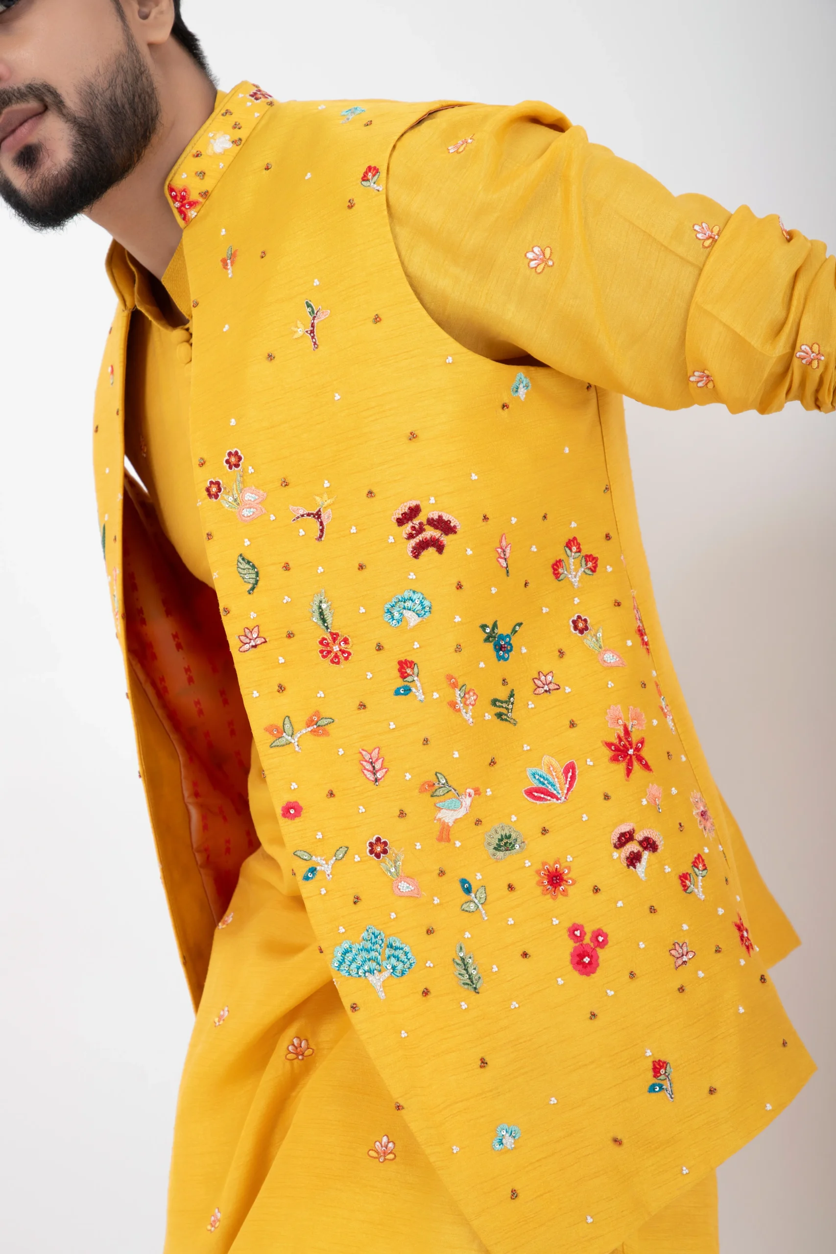 Marigold Yellow Embroidered Nehru Jacket with mandarin collar from Golden Muslin By Anuj Agarwal