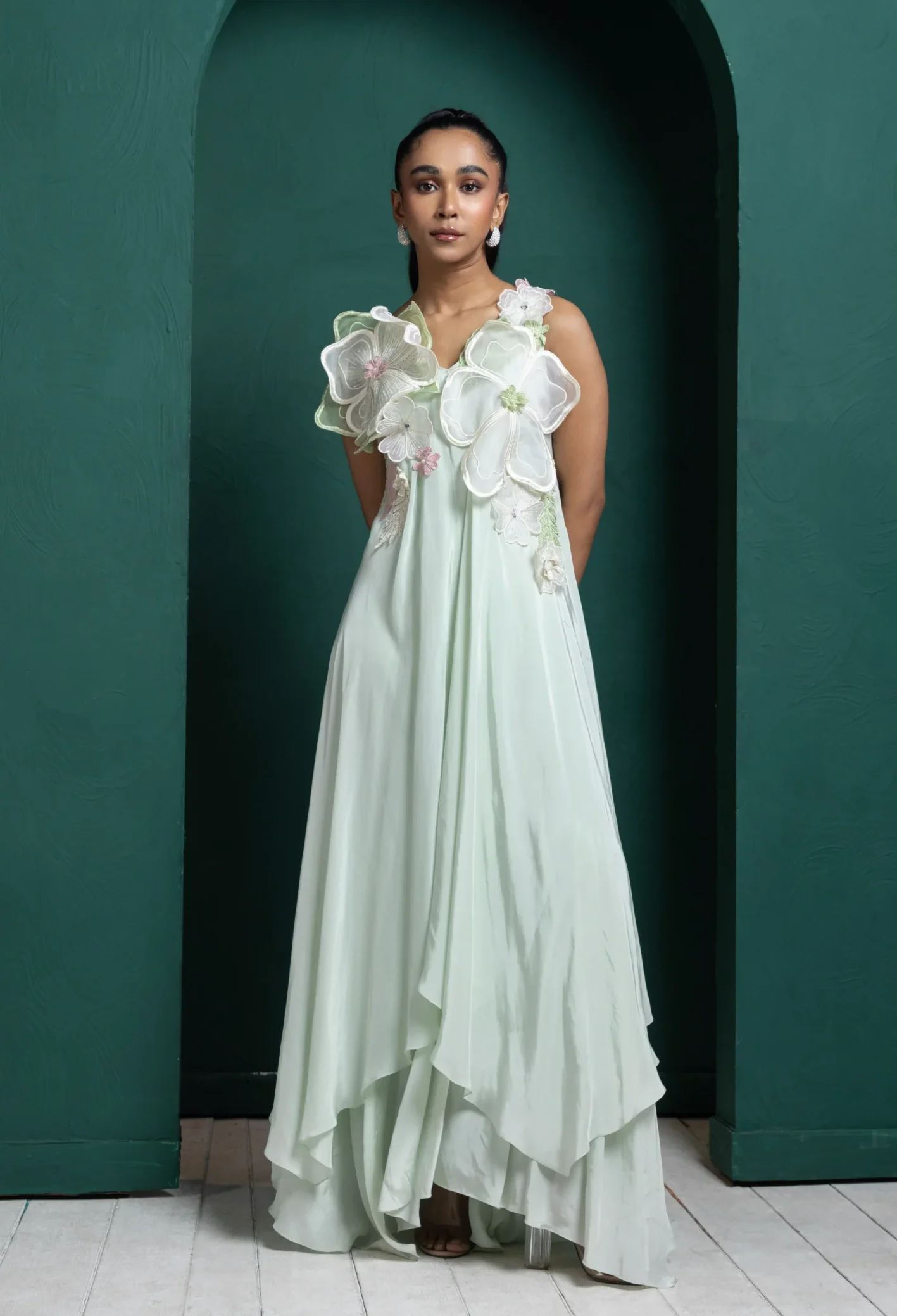Mint Green Floral Applique Layered Gown with pastel flowers from Golden Muslin By Anuj Agarwal