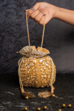 Gold Beaded Embellished Potli Bag with Intricate Detailing and Tassel Finish