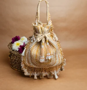 Baraq Gold and White Beaded Potli with Intricate Work and Tassel Detail