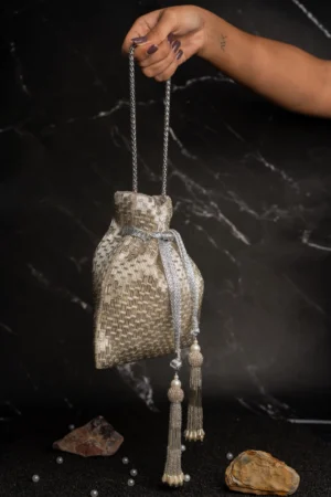 Silver Tube Beaded Geometric Potli Bag with Structured Texture and Tassels